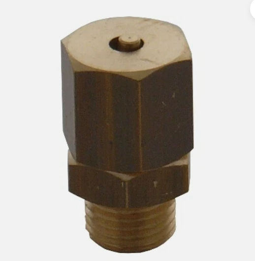 Brass fitting on a white background