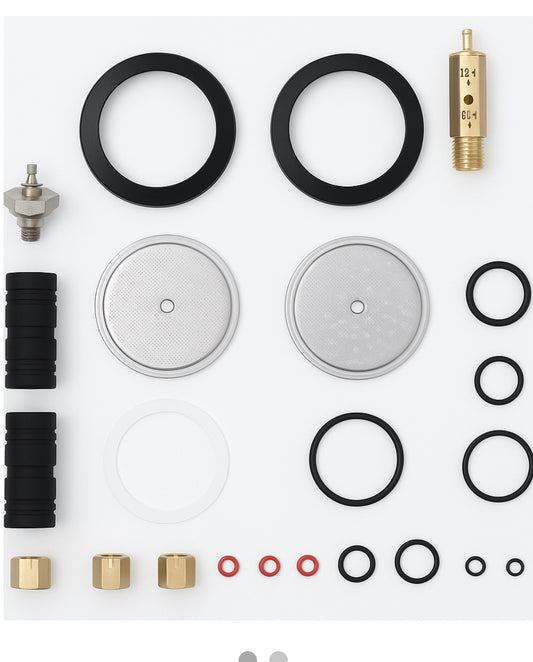 Collection of plumbing parts including washers, O-rings, and connectors on a white background
